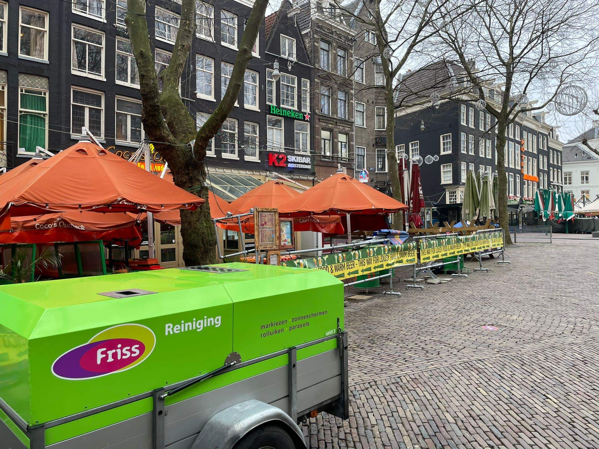 Reinigen parasol terras zakelijk schoon horeca Amsterdam